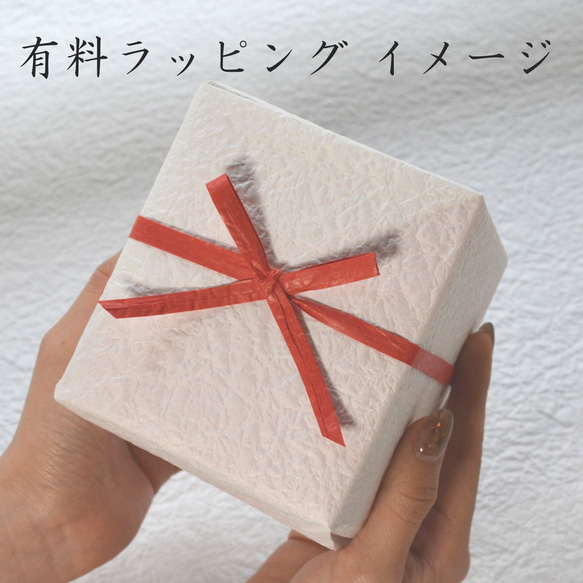A clear glass with a sculpted Mt. Fuji design at the bottom, presented inside a wooden box. – view 6