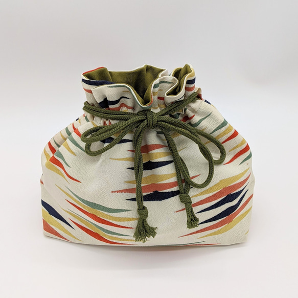 A rectangular hand-woven Suruga bamboo basket bag with a red leather handle and a vintage white silk drawstring inner pouch featuring a mist pattern – view 7