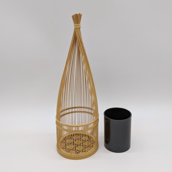 Handmade Suruga bamboo flower vase shaped like bundled straw, standing elegantly with its detailed patterns on its woven base – view 3