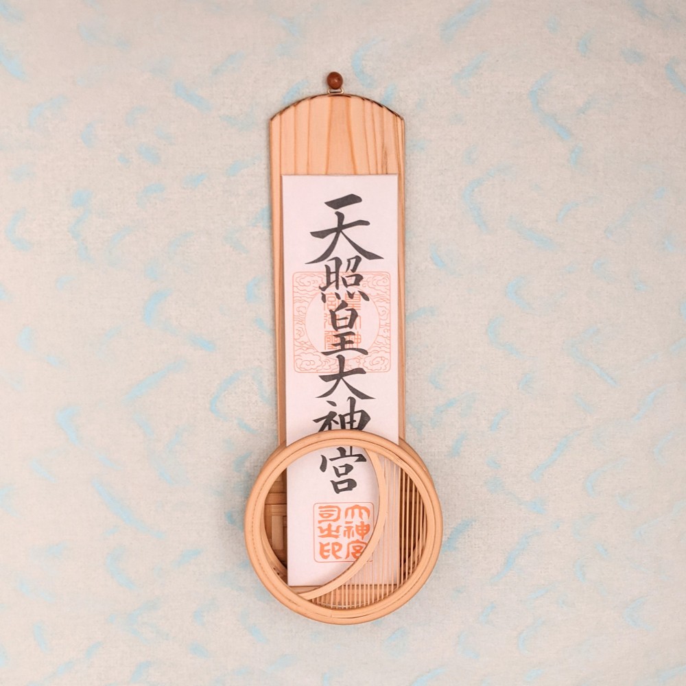Modern wall-mounted wooden kamidana ofuda holder featuring a delicate bamboo crescent moon design and cedar backplate