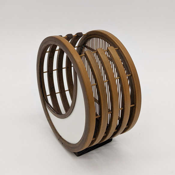 A crescent moon-shaped bamboo flower vase featuring a blend of traditional woven bamboo splints and modern white leather detailing. – view 6