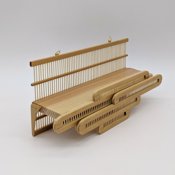 Compact modern wall-mounted Kamidana made of delicate vertical bamboo sticks and a cedar base, featuring a carved bamboo cloud motif. – view 6