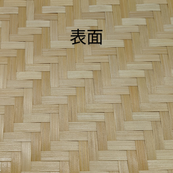 A hand-woven oval bamboo serving tray in natural beige, displaying traditional Japanese ajiro wickerwork on the base and smooth rounded bamboo curves. – view 5