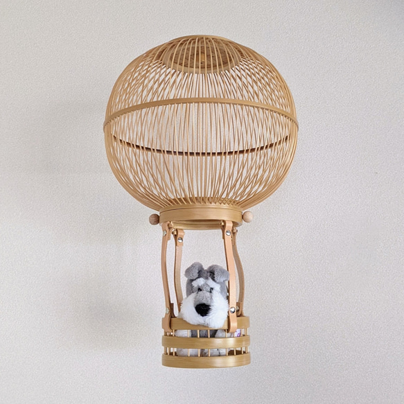Handcrafted Suruga bamboo hot air balloon hanging ornament with leather accents and a small removable basket. – view 2