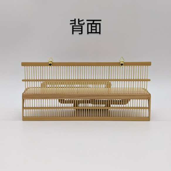 Compact modern wall-mounted Kamidana made of delicate vertical bamboo sticks and a cedar base, featuring a carved bamboo cloud motif. – view 8