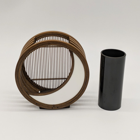 A crescent moon-shaped bamboo flower vase featuring a blend of traditional woven bamboo splints and modern white leather detailing. – view 9