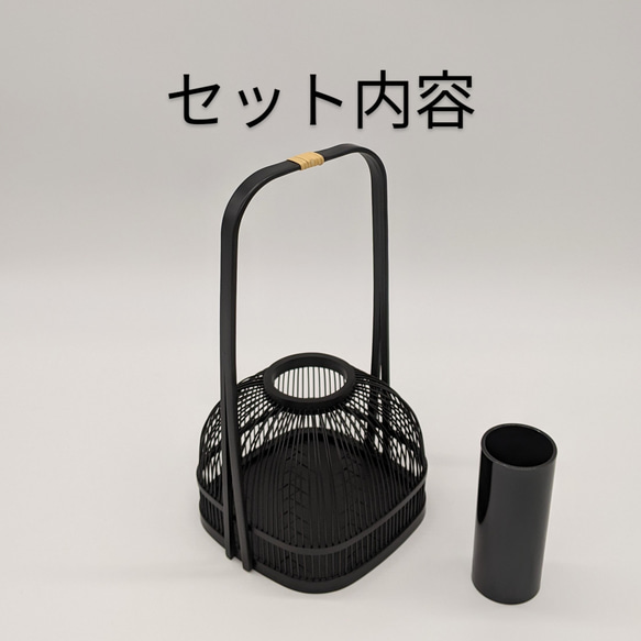 An elegant black Suruga bamboo flower vase with a rattan-wrapped handle, showcasing intricate vertical bamboo lattice work. – view 5