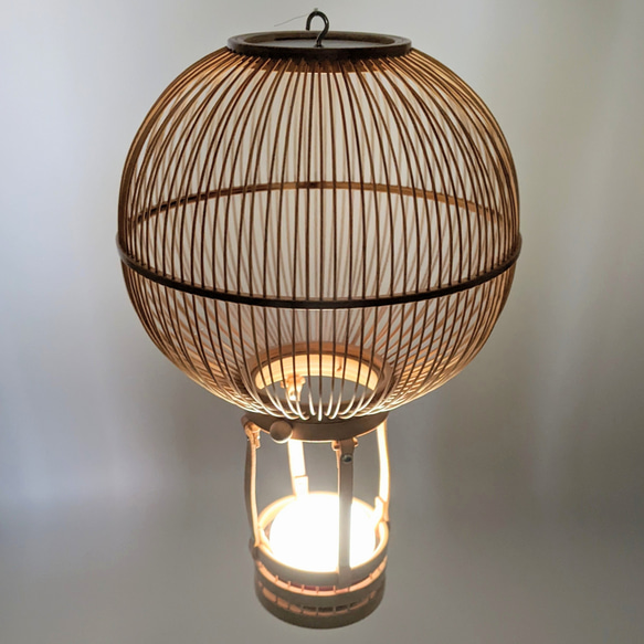 Handcrafted Suruga bamboo hot air balloon hanging ornament with leather accents and a small removable basket. – view 13
