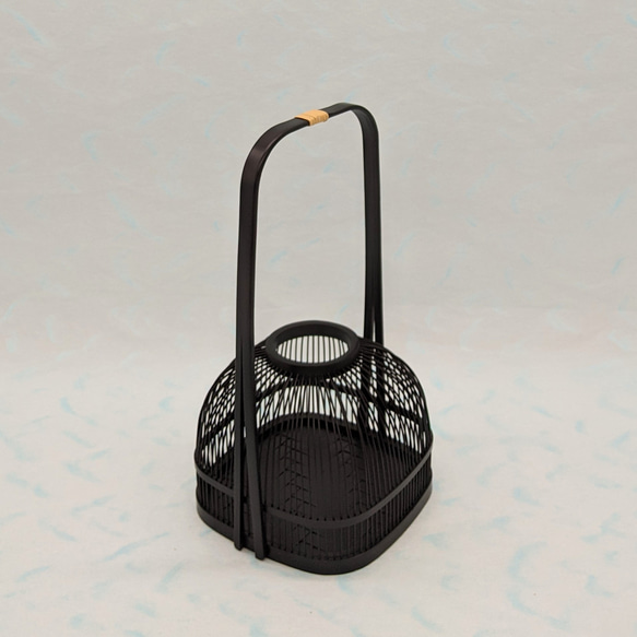 An elegant black Suruga bamboo flower vase with a rattan-wrapped handle, showcasing intricate vertical bamboo lattice work. – view 6