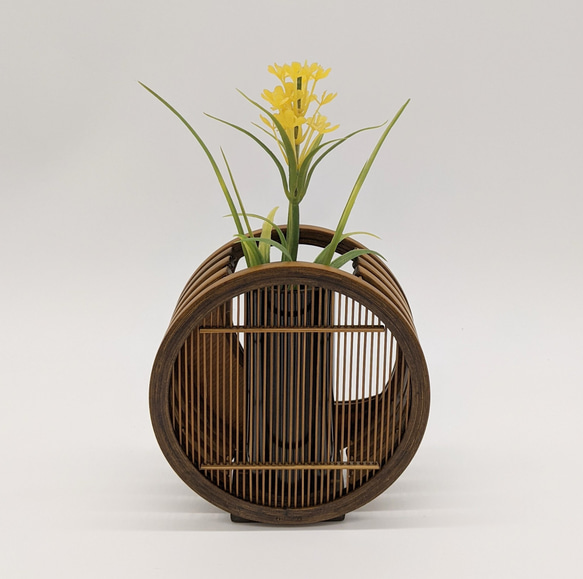 A crescent moon-shaped bamboo flower vase featuring a blend of traditional woven bamboo splints and modern white leather detailing. – view 4
